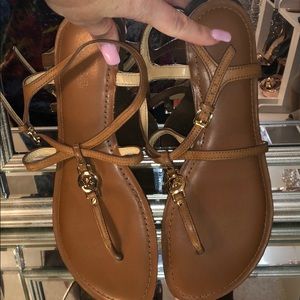 Tan Michael Kors Flats with gold hardware